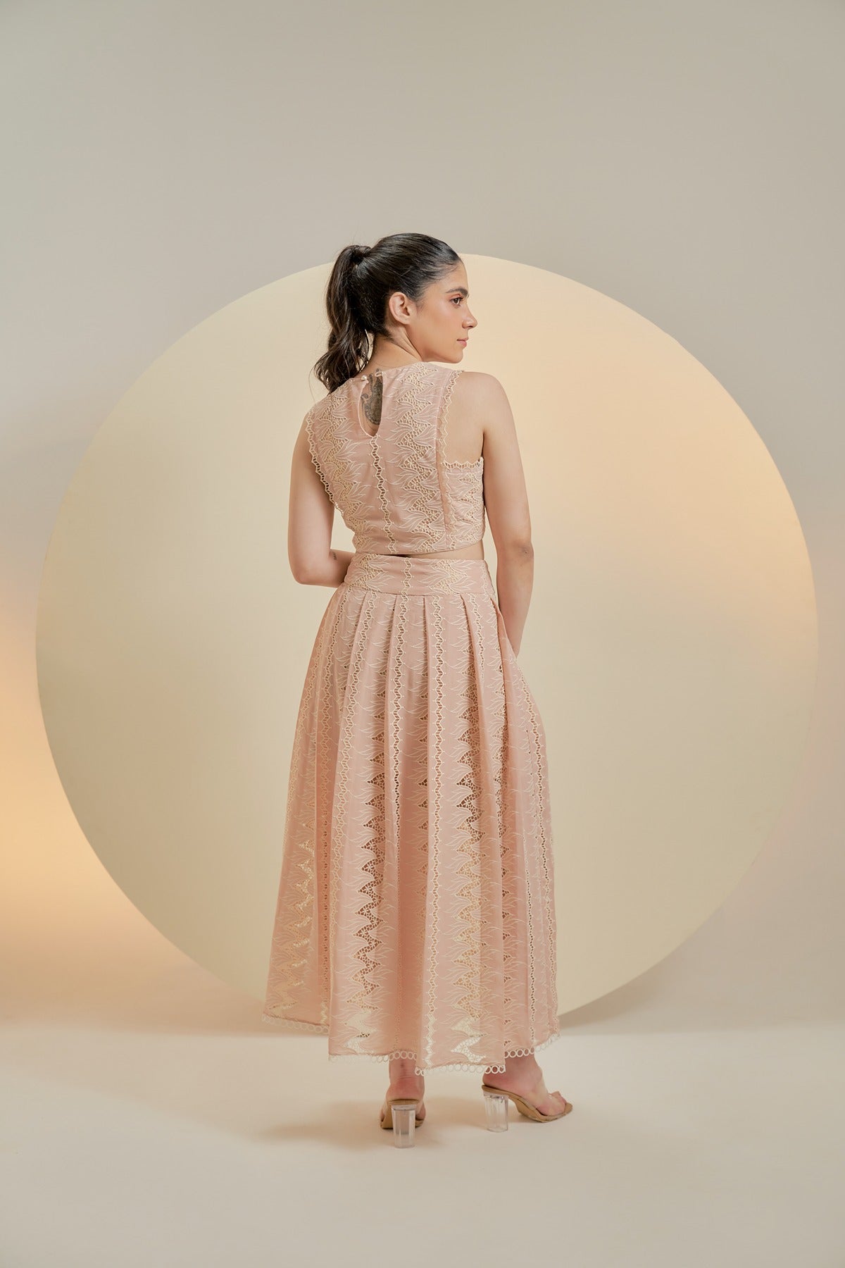 Light pink embroidered sleeveless crop top