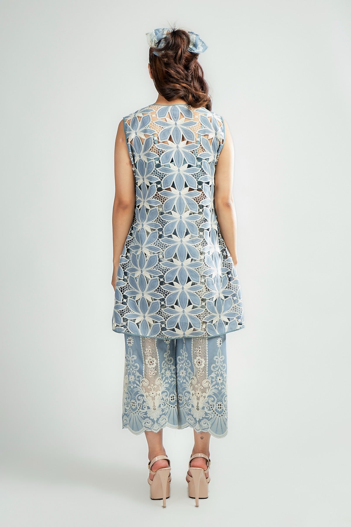 Pastel Blue cutwork embroidered jacket with pearl detailing and Inner and pastel blue thread embroidered pants