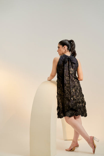 Black embroidered cocktail dress with tie detail